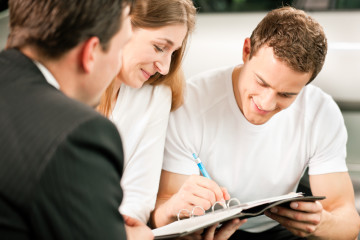 Auto Insurance signing papers, houston, Texas.