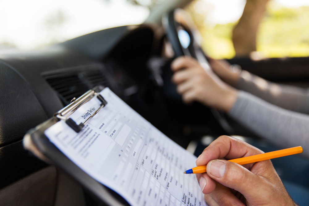 teacher giving a driving exam on texas