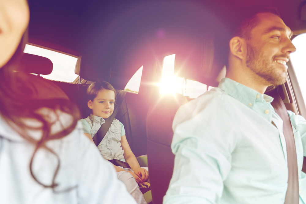 family driving in car