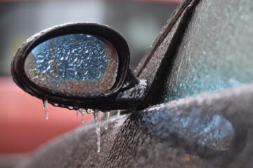 freezing rain in dallas, iced over mirror on car