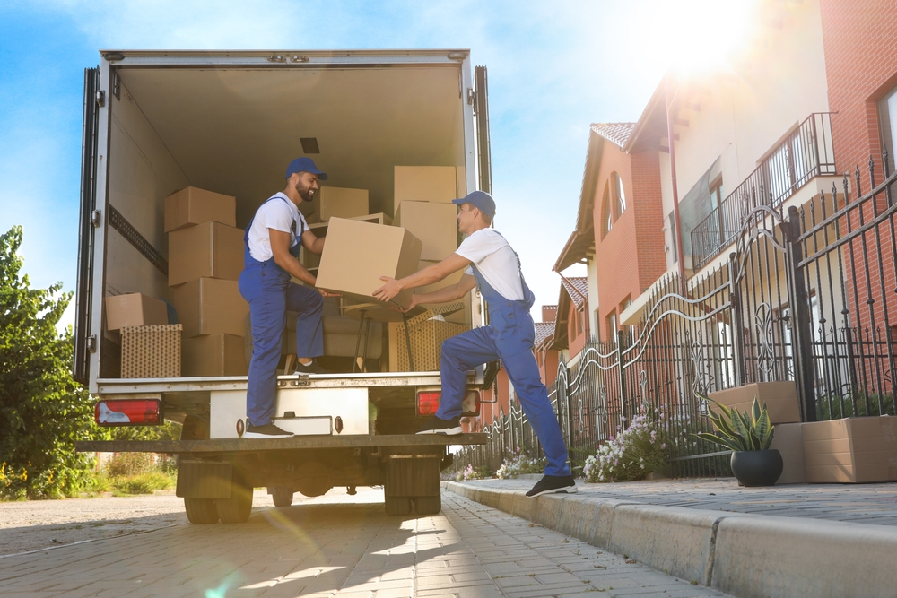 movers taking out boxes from truck