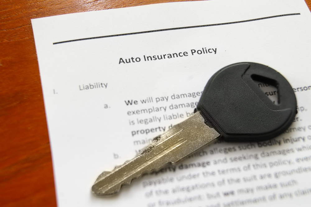 auto insurance form with car key