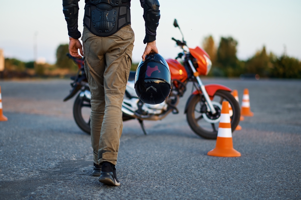 man walking to motorcycle safety course