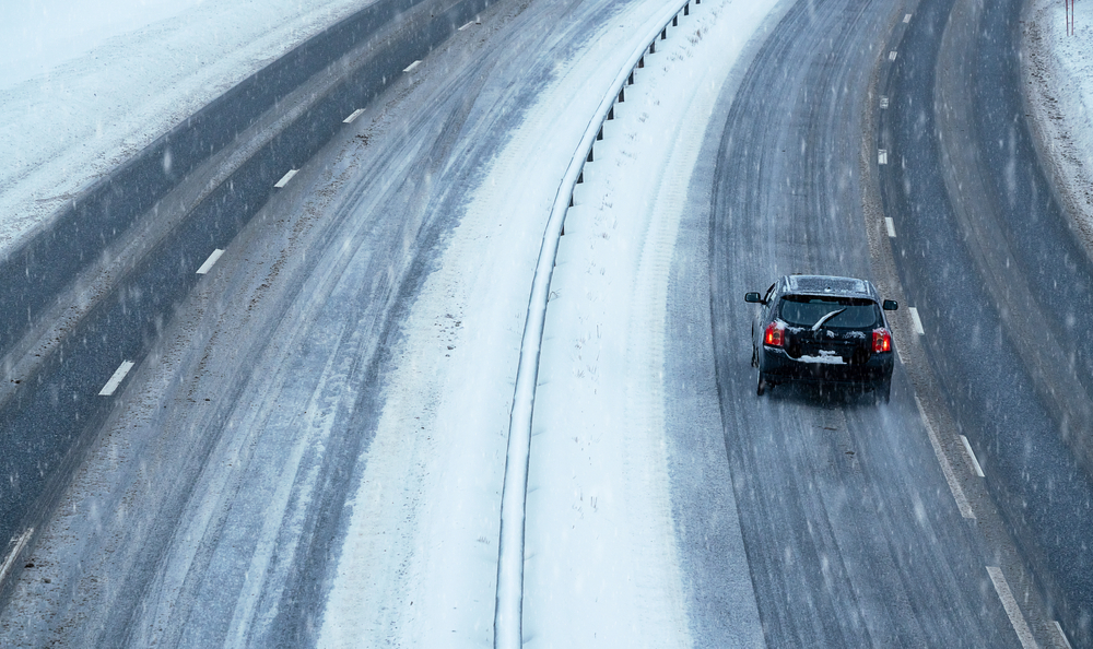 car driving on icy highway